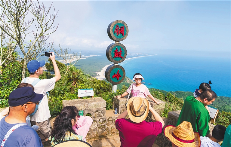 Tourists climb high and look far